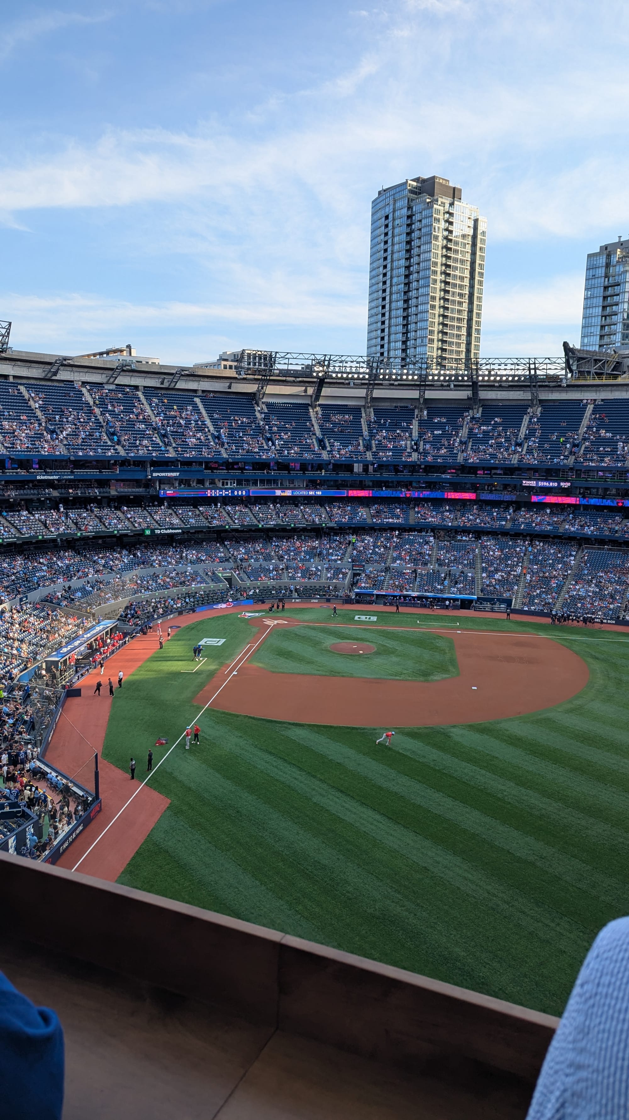 A photo of the baseball field in Toronto Blue Jays stadium from the highest level.